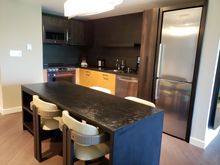 Kitchen is compact but functional.