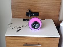 External speaker feature looked promising, though I didn't use it. Bright, rotating colors seemed a problem for sleeping, but I stored the device in the drawer for the night and all was well! 
