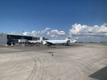 We’ve pushed back. Only parked planes in view. Not much movement other than the ramp agent handling our flight.
