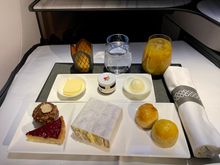 Afternoon tea service as a snack mid way. Scones were warm and the pastries great.