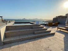 Plunge pool - probably can hold 8-10 people seated 