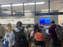 UA Priority Check-In Line