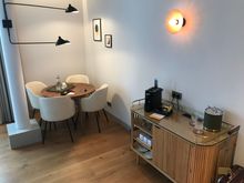 Living room: large round table with 4 seats