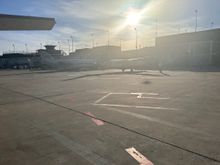 Crappy shot of a retro AW CRJ-200 and another Southern C208.