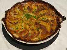 Potatoes au gratin with Comte , ..