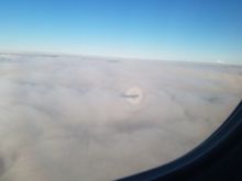 Flying into a circular rainbow