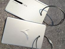 Cathay Pacific metal luggage tags