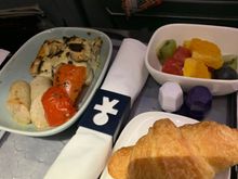 Mushroom frittata with fruit and croissant