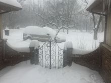 I live about 19 miles SSW of MDW. This is a picture taken Friday out my front door, and we had at least 3 more inches after this. 