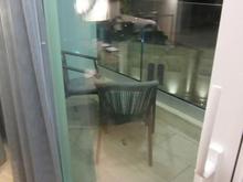 Small outdoor balcony -- there is no way to turn off the balcony light at night however there the blackout curtains mostly did their job