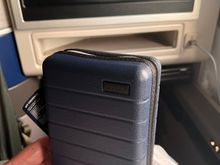 New amenity kit - hard sided but will easily crush due to cloth hinge / zipper