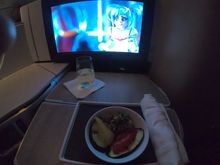 Midflight snack that wasn't full of salt or pork. It was quite good and chilled. Taboulah and grilled veggies. 