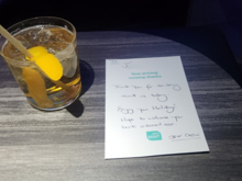 Woodford & soda with orange zest (a surprisingly nice touch and not something I ever thought to try) and a nice note from the crew. The two Mint crewmembers were the same as my last flight, but the note was handed to me by one of the FAs from the back!