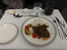 Main course at dinner LAX-SIN. Ginger Beef.