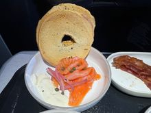 Smoked salmon - crème fraiche, capers, pickled onions, bagel crostini.  
One of my favorite breakfast items.  A little crostini with the crème fraiche, a piece of the pickled onion, and a nice sized serving of the smoked salmon!