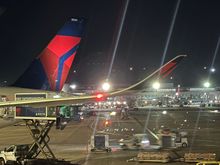 Winglet and tail of an A350 at E getting ready for the late evening departure to ICN. 