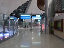 Right where I'm standing is a couple of lounge dragons to determine access -- if you have access to the J lounge, you are permitted to use the regular F entrance into the lounge (temporarily for J passengers).  F lounge access is at the side entrance next to B17 (upper floor boarding still available). 
