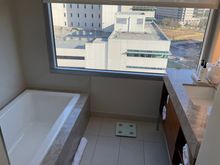 Oops, i didn't quite see you there.... especially if one takes a bath with a view, fortunately there are drop down blinds available