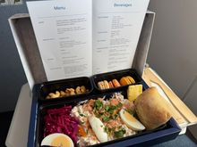 Salmon on potato salad and pickled red cabbage