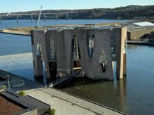 I always have found this building to be interesting, even more so when it is surrounded by frozen water