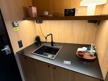 I am guessing they used to have a hot plate or microwave for basic cooking here, based upon the size of the countertop.