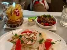 BA2231 LGW-BKK 1st meal starter: salmon, fennel, and citrus salad. Served with a small quinoa side salad and a Schär gluten free roll (cold, despite being packaged in “ovenable” wrapper). The best course of the trip, despite the cold roll, fresh flavoured and a good size.