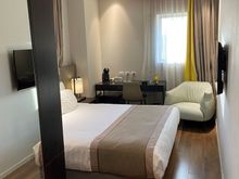a small "deluxe" room
