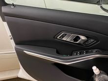 Driver Door Panel - it holds a 1L bottle easily. 