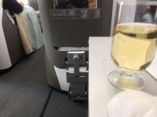 Before. Glass of CW flat, warm champagne.