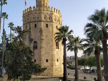 The old tower by the river in Seville 