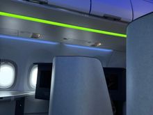 Mood-lighting fluctuated between blue and green during boarding 
