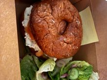 Bagel with lox and cream cheese.