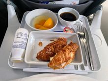 AZ717. The croissants were warm, one with ham and cheese and the other sweet.