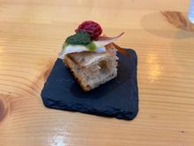 First amuse bouche, a small piece of bread with a cut of ham, a bit of pesto and a bit of tomato paste. Excellent way to showcase the italian fresh tastes to come.