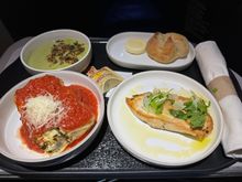 Chilled pea soup, lasagna, chicken paillard, bread roll