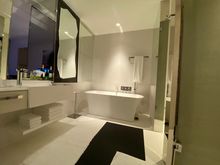 Decent bathroom with window into main room area