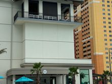 Upstairs outdoor area was described as a "common area" with bar service. However, the bar isn't staffed full time. 