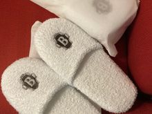 Very nice slippers, they cost you too if you pilfer them ..... oddly i did not see any bathrobes in our room