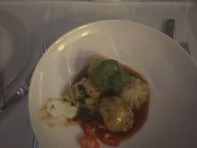 Vegetable dumplings with one cut open to see inside. Supposed to be with spicy garlic sauce. It was spicy but I wouldn’t say it was garlic. 