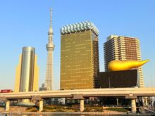 See the building that kind of looks like a beer? That’s where we’re going.