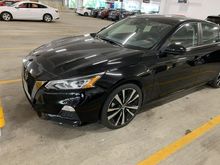 Nissan with performance rims in the 5-star lot