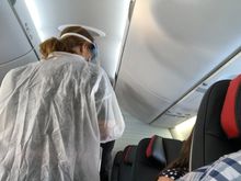 One of the FAs chose to wear a disposable gown over her uniform. She also wore a full face shield. 