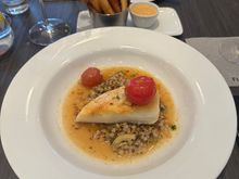 Halibut without mushrooms and with a side of fries. 
