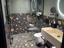 The bathroom floor is a bit unusual