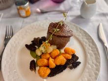 Grilled beef tenderloin with morel jus sweet potato gnocchi and sautéed vegetables

One of the better steaks I’ve had onboard QR - 9/10