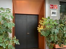 Streetwise entrance to Quirat : hotel guests can walk through the lobby and restaurant Arrel to reach Quirat confy indoors