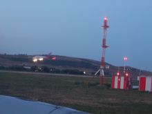 we held short of runway for quite some time, as this freigher(?) Saab came in.
