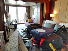They put the plastic tarp over the bed so the suitcases don't mess up the linens. One difference between Seabourn and Silversea is that you can have your SS butler unpack and pack for you. That is the best! The bed was made up as a queen, but they switched it to two twin beds upon request.