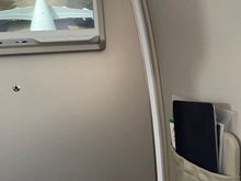 Trip 1 - The bulkhead & TV screen (you need very long arms) NB. There is no remote control for the TV in any of the PE seats.