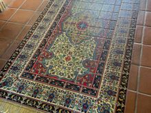 I particularly liked this tile "rug" near the front of the main house.
